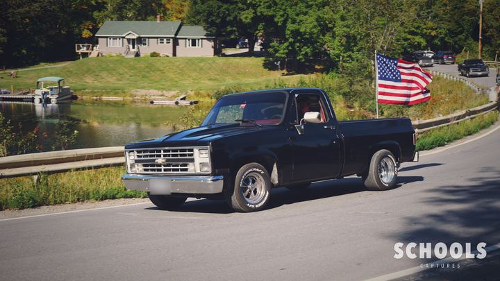 Black square body with flag
